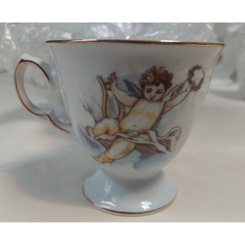 Trisa Porcelain Cherub‎ Teacups Set of 4 Angel Harp Gold Trim Footed Tea Cups